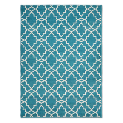 A rectangular area rug featuring a repeating geometric trellis pattern in teal blue and off-white, shown flat against a plain white background.