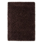 A rectangular dark brown shag rug with a thick, plush pile texture, shown flat against a solid white background.