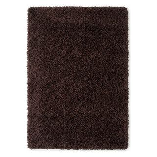 A rectangular dark brown shag rug with a thick, plush pile texture, shown flat against a solid white background.