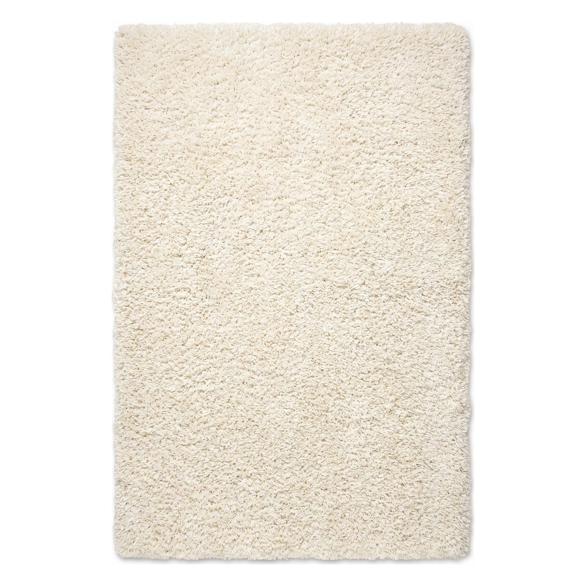 A rectangular high-pile shag rug in a warm cream or ivory color, shown from a top-down view on a plain white background.