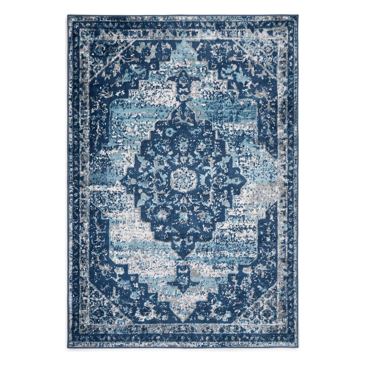 A rectangular area rug with a distressed traditional medallion pattern in shades of navy, medium blue, and light blue on a white background.
