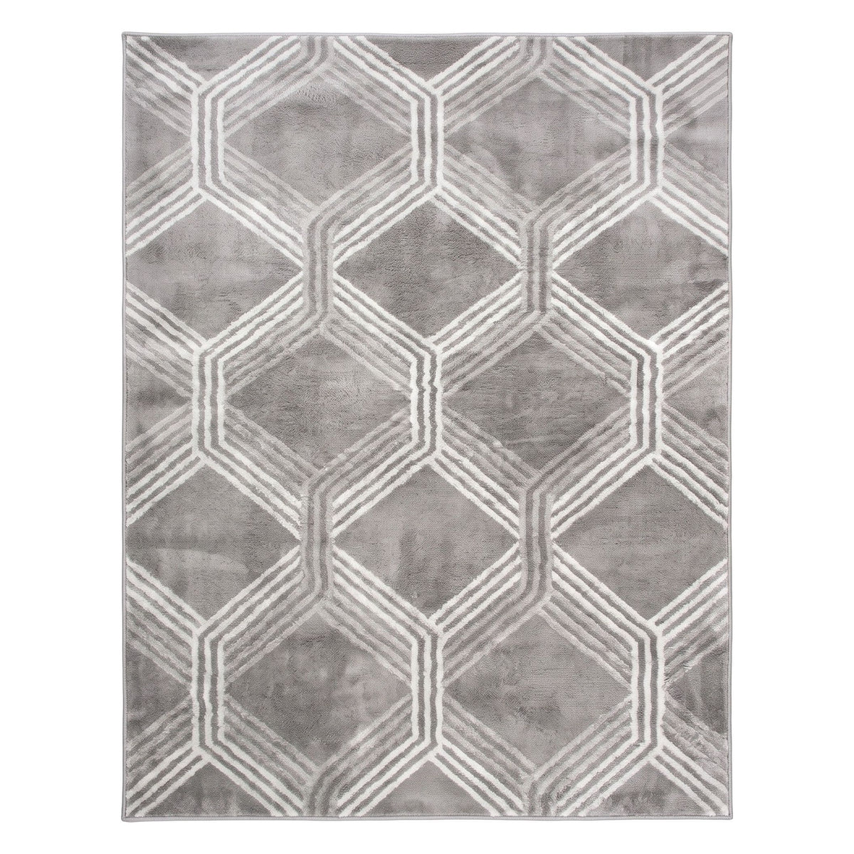 A rectangular area rug with a modern geometric pattern of interlocking hexagons and diamonds in shades of gray and white, shown flat against a white background.