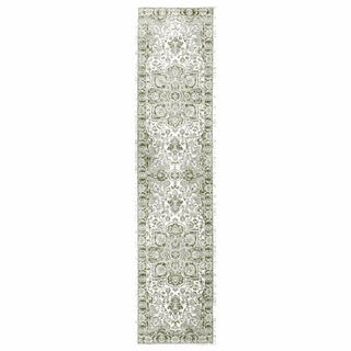 A long rectangular area rug with an ornate traditional floral pattern in muted sage green, beige, and off-white tones, shown flat against a solid white background.