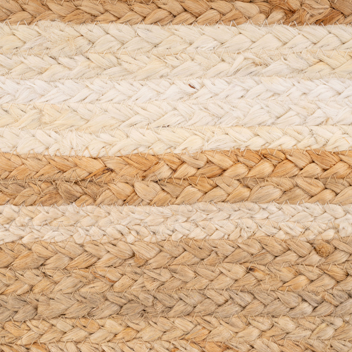 Close-up of a woven pattern with alternating beige and white stripes.