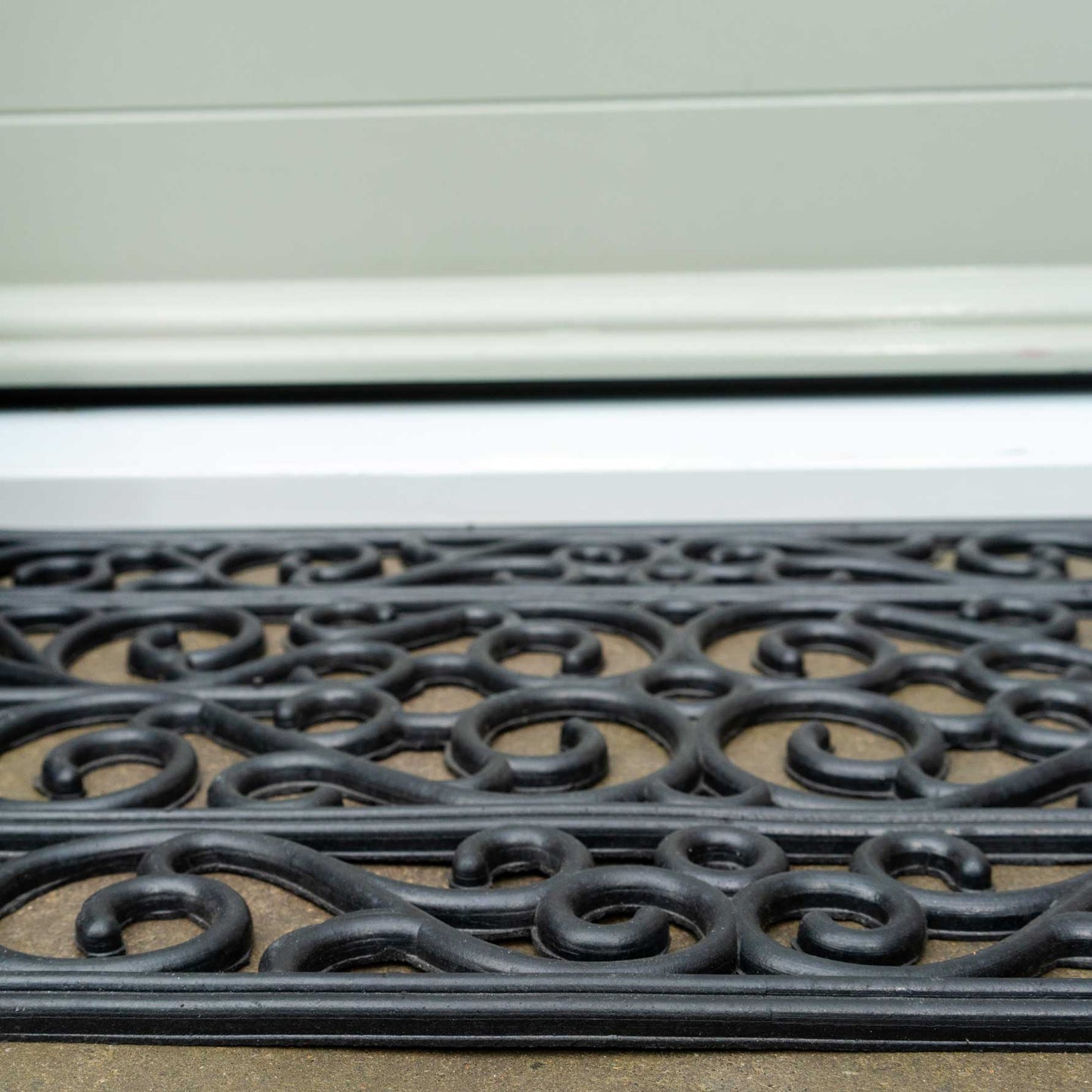 Long Ornate Iron Border Rubber Doormat