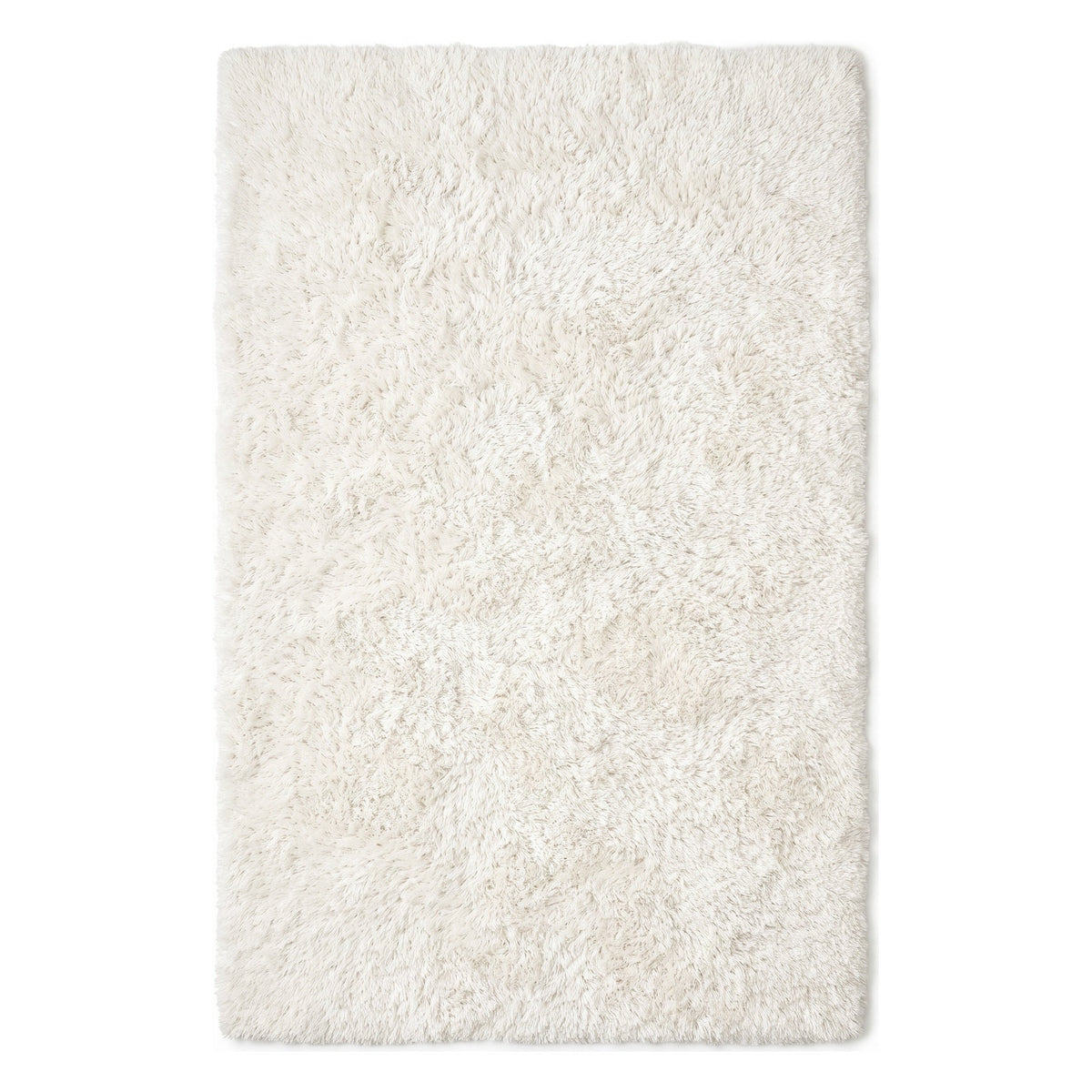 A rectangular shag rug in a warm off-white or cream color, shown from a top-down view against a plain white background.