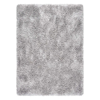 A rectangular shag area rug in a light gray color, shown from a top-down view against a plain white background.