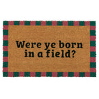 Doormat with text 'Were ye born in a field?' on a white background