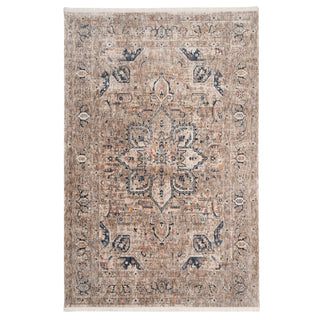 A rectangular Blue Terra Medallion Area Rug with a central floral medallion design and folded patterns in a mix of blue and earthy tones.