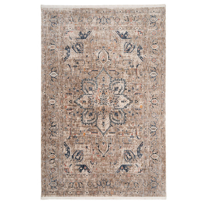 A rectangular Blue Terra Medallion Area Rug with a central floral medallion design and folded patterns in a mix of blue and earthy tones.