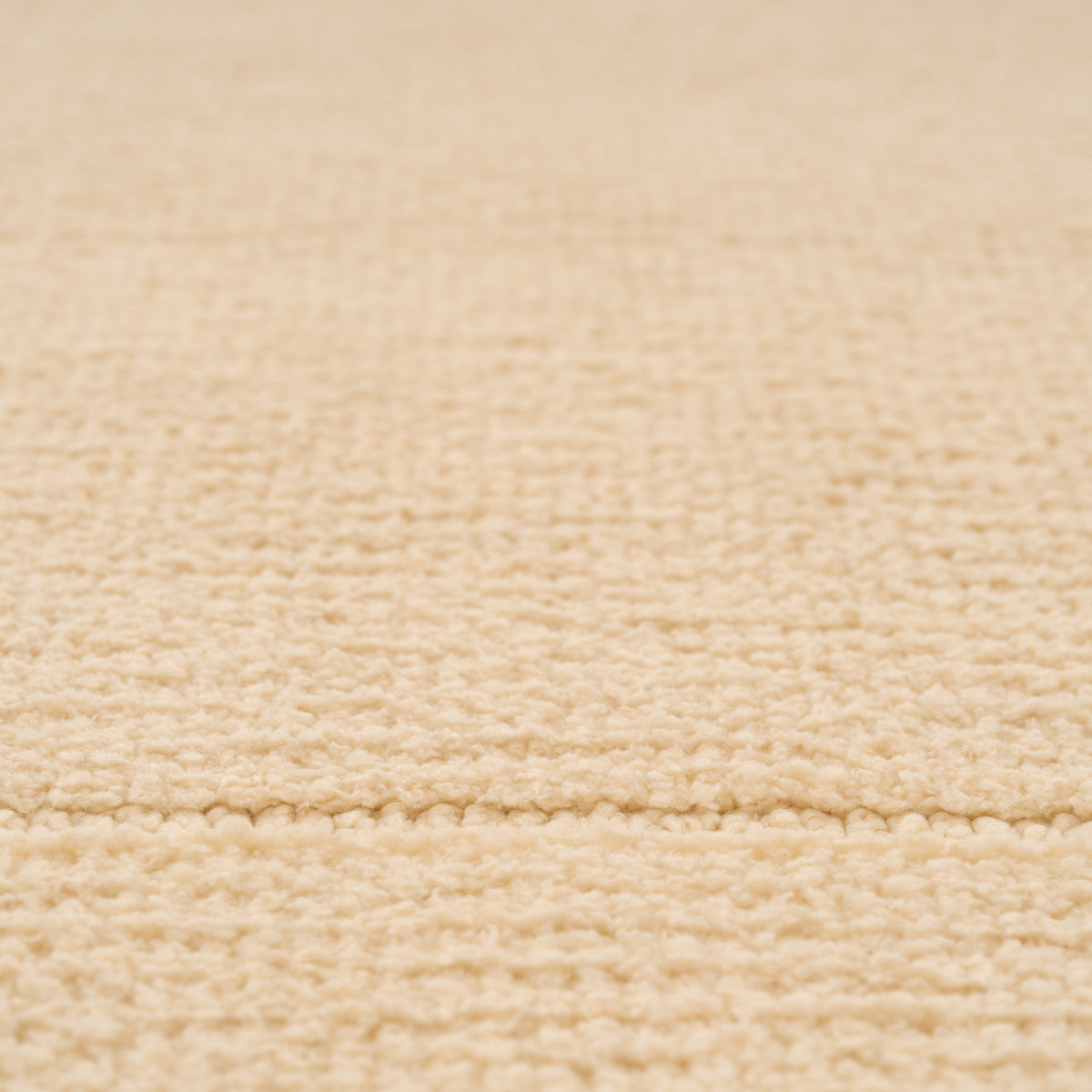 Close-up of beige fabric texture