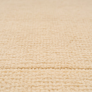 Close-up of beige fabric texture
