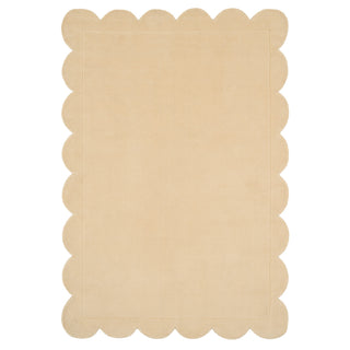 Beige scalloped placemat on a white background