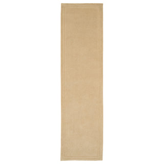 Beige runner rug on a white background