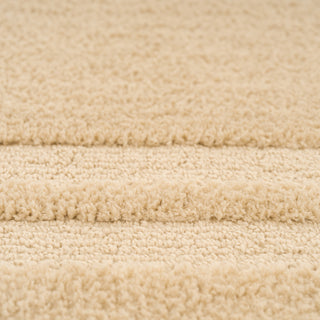 Close-up of beige carpet texture