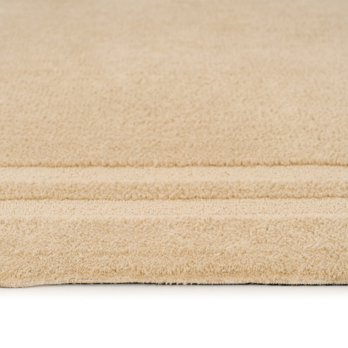 Close-up of a beige textured surface