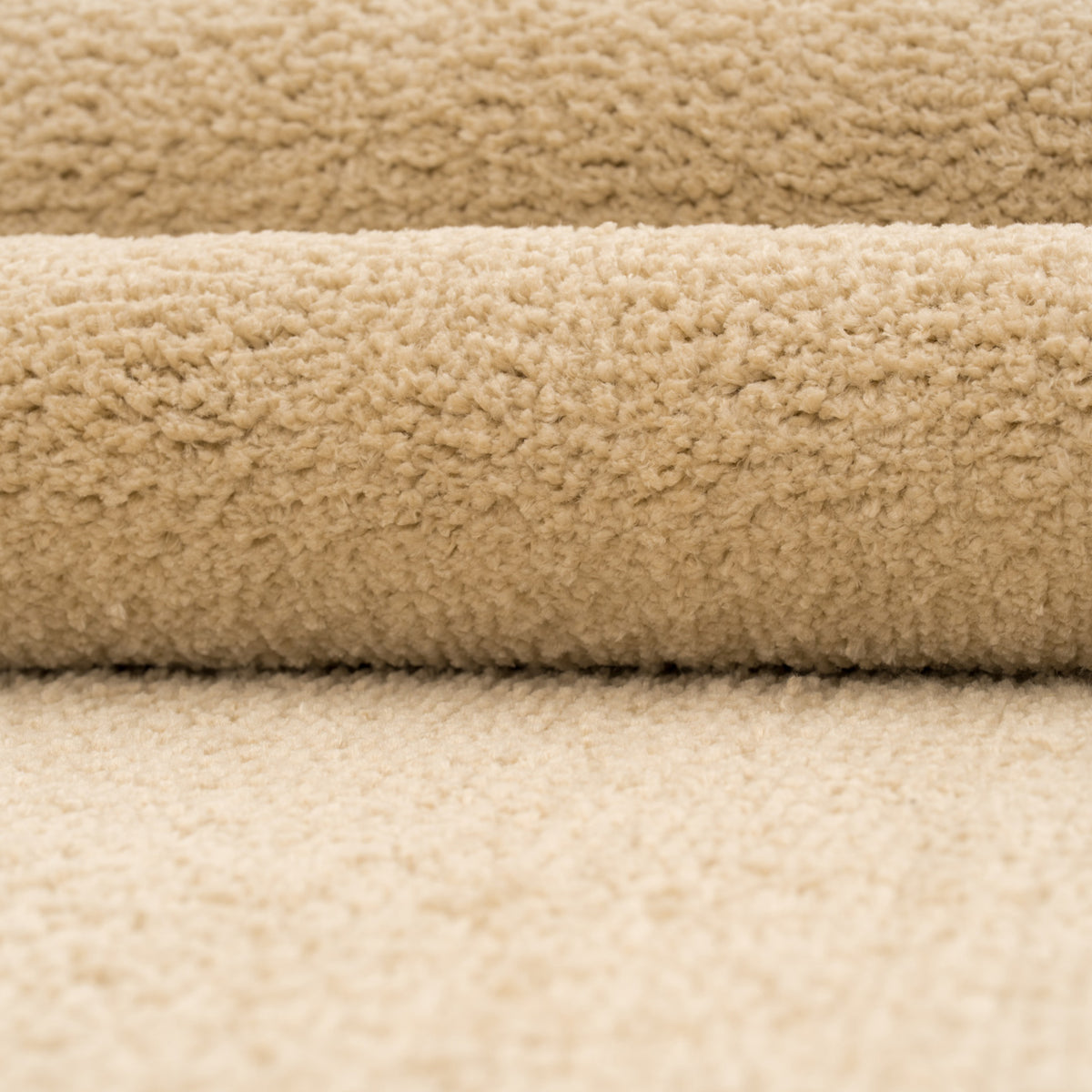 Close-up of beige carpet samples