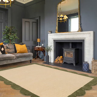 Living room with gray sofa, fireplace, and decorative elements.