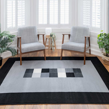 Geometric Bordered Black and Grey Rug